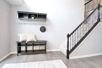 Bright and airy two story entry.