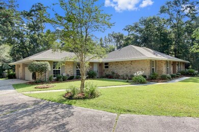 3 car garage and plenty of paved parking.