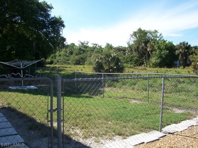 View of fenced back yard from Patio