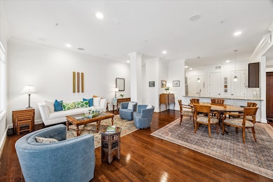 This unit offers hardwood floors, high ceilings an