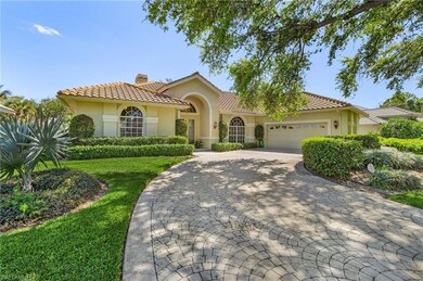 Mediterranean / spanish home with an attached gara