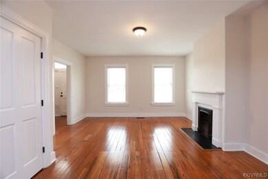 View of hardwood floored living room