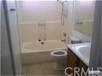 Upstairs bath with oversized tub.