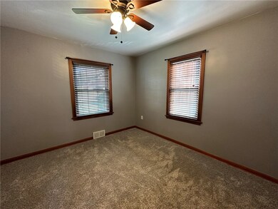 Master bedroom with newer light fixture and large
