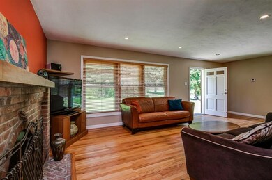 Living room with stunning floors and recessed ligh