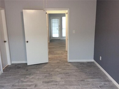 Bedroom has adjoining bath with large walk-in clos