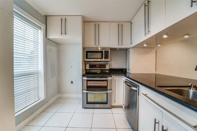 Enjoy a sleek kitchen with updated hardware and ap