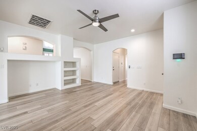 living room featuring light wood-style flooring, b