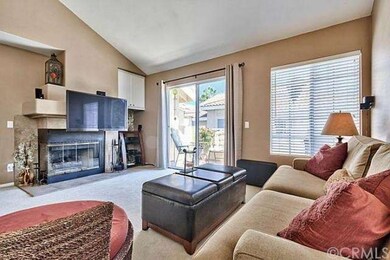Light and bright living room features a fireplace,