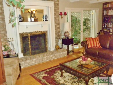 FORMAL LIVING ROOM WITH FIREPLACE & WETBAR