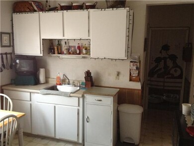 Kitchen Laundry room, bathroom, rear bedroom off k