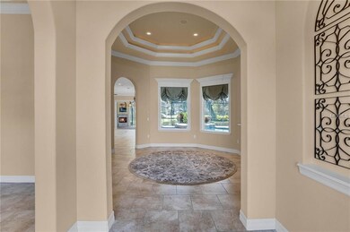 Entering front door with view to pool