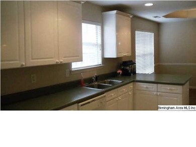 You will enjoy slaving over the stove in this spac