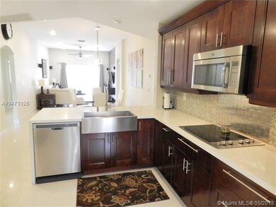 Kitchen overlooks living and dining room for open 