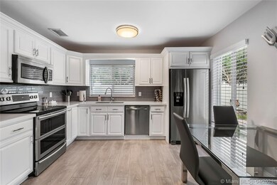 Eat in Kitchen with White Wood Cabinets,  NEW Stai