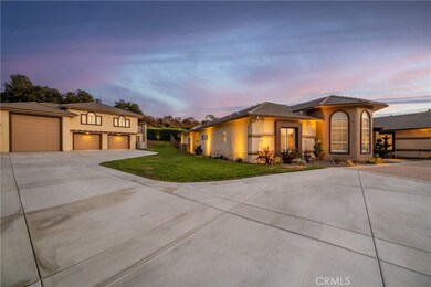 A great view of the garage and guest quarters above