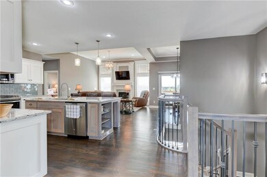 View of kitchen and living room from front door