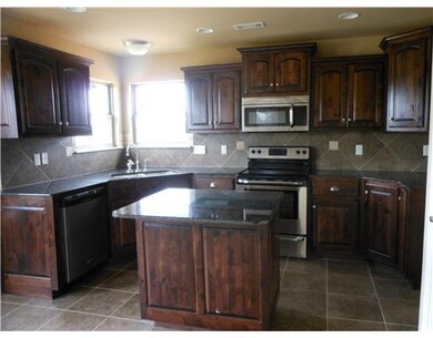 Kitchen. Kitchen has granite countertops, stainles