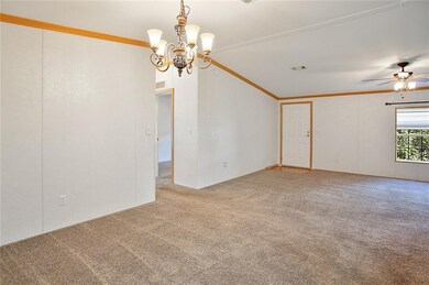 View from the kitchen to the dining area and livin