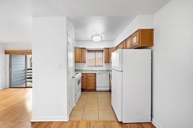 The kitchen has Ceramic Tile Flooring, Fresh Paint