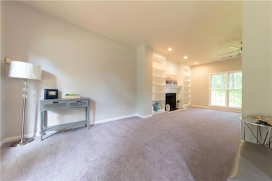 Unfurnished living room featuring recessed lightin
