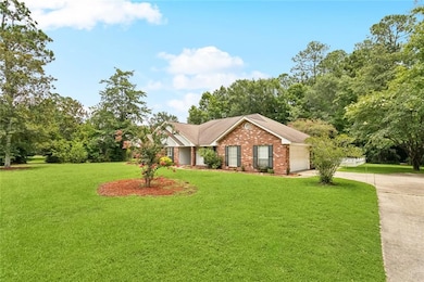 Oversized garage with lots of parking and rear-yard access.
