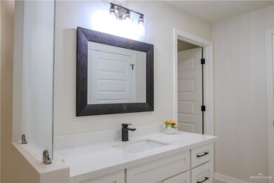Bedroom One- Bath Vanity with privacy glass
