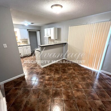 Interior space with a textured ceiling