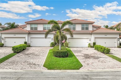 Mediterranean / spanish-style house with a garage