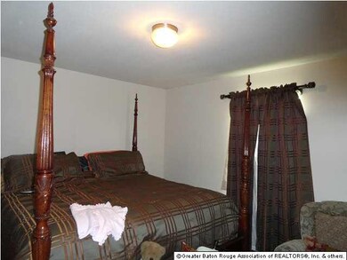 MASTER BEDROOM OVERLOOKS LAKE