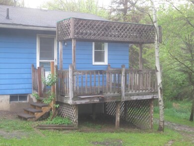 closeup of 12' x 12' rear wood deck with covered B