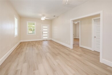 Unfurnished room with light wood-style floors, a c