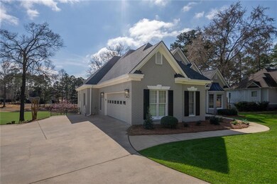 View of front of house featuring a garage and a fr