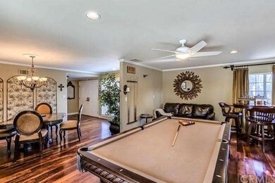 Formal living room with recessed lighting and fire
