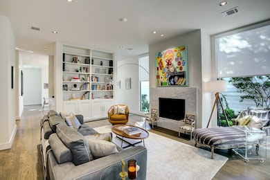 Built in shelves and ample storage in the formal living room.