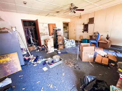 Miscellaneous room featuring a drop ceiling and ce