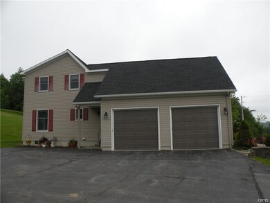 Two attached heated garages!