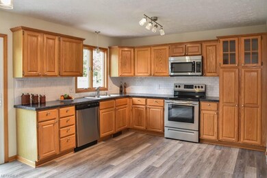 Updated kitchen with stainless steel appliances.