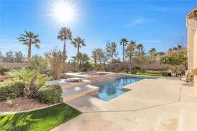 View of pool with a patio area, a fenced in pool,