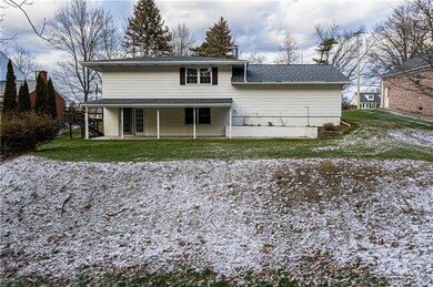 Large rear covered concrete porch.