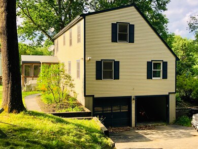 Side/2 car garage