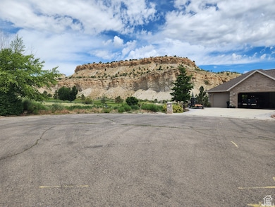 View of front of house with a garage and a mountain view