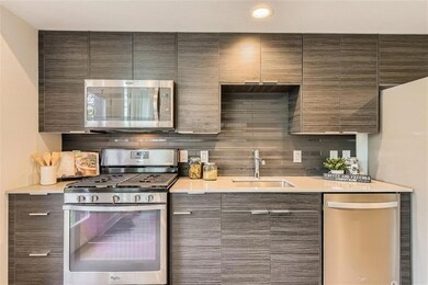 Kitchen with appliances with stainless steel fini