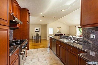 Upgraded custom Kitchen with granite counters & st