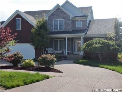 Front of home; notice circular drive.