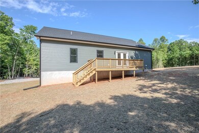 The back of the home features a large deck.