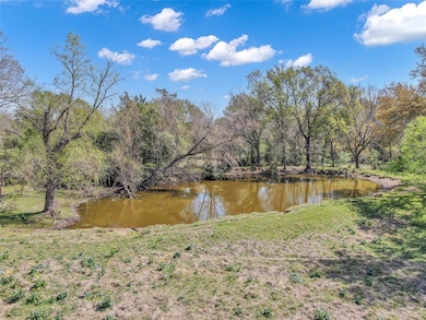 Stocked pond located in the middle of property