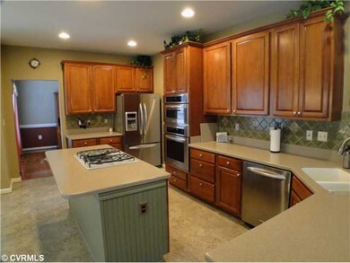 Kitchen - The Gourmet Kitchen Has Natural Cabinets