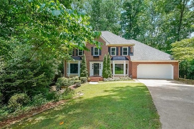 2 car garage with kitchen entry, insulated garage door, storage room