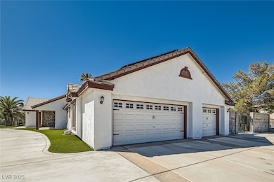 View of property exterior featuring a tiled roof,